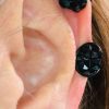 Black Flower Keloid Earrings Pressure Clip Pair - Image 3